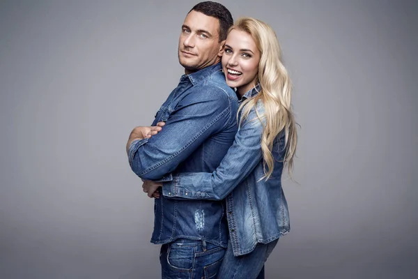 Beautiful couple wear fashionable jeans clothes — Stock Photo, Image