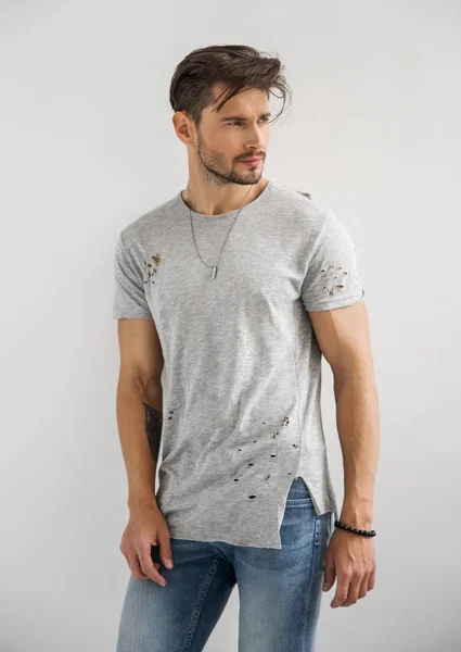 Man in grey t-shirt — Stock Photo, Image