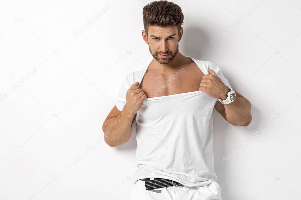 model stretching his t-shirt