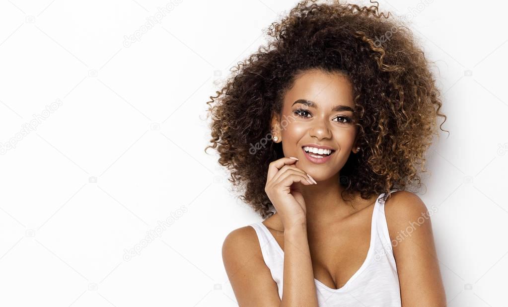 Portrait of smiling young black woman  