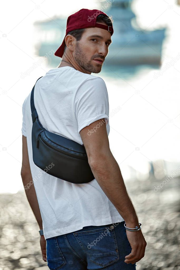 Handsome man in daily outfit wear bum bag