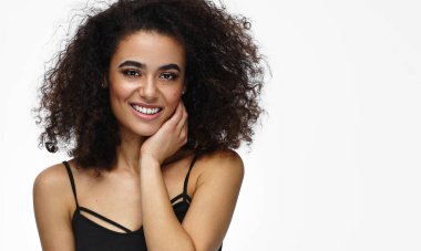 Beautiful cheerful african american woman looking at camera, wom