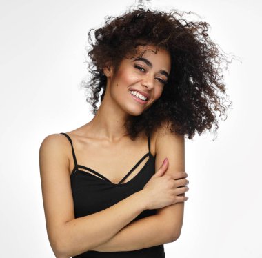 Portrait of african american woman with freckles and afro hairst