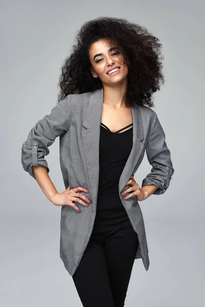 Beautiful cheerful latin american woman wear gray jacket isolate — Stock Photo, Image