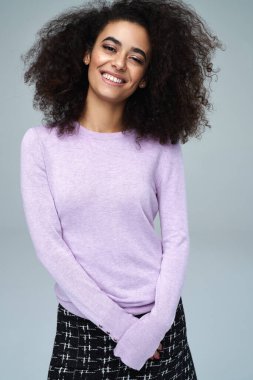 Beautiful latin american woman smiling at the camera. Isolated o