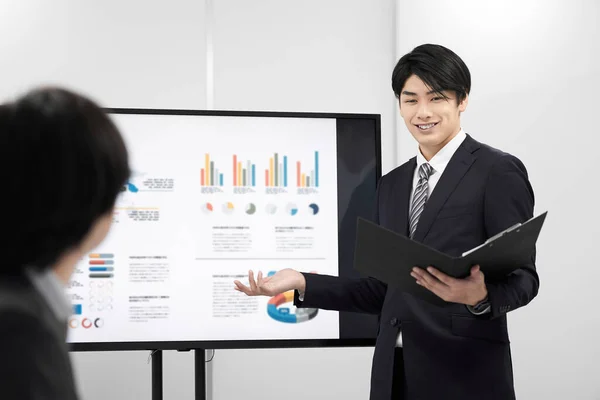 Japanese Male Businessman Giving Presentation — Stock Photo, Image
