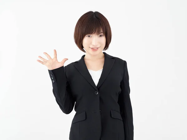 Японська Жінка Офісний Працівник Подає Ятиточкову Позу Білому Тлі — стокове фото