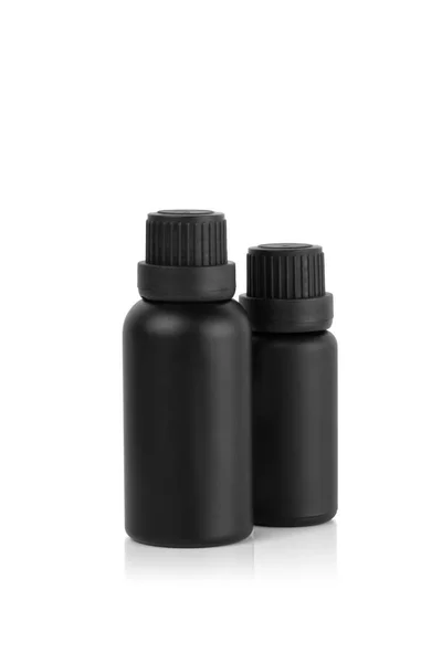 Makieta Dwie Puste Czarne Butelki Olejku Eterycznego Odizolowane Białym Tle — Zdjęcie stockowe
