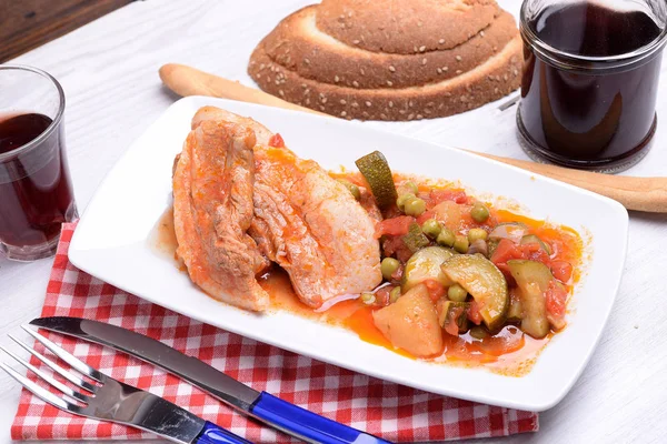 Pork stew with tomato sauce with potato and zucchini peas — Stock Photo, Image