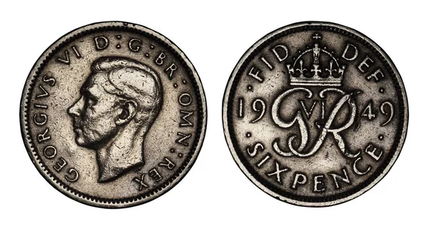 Engelska sex pence mynt från 1949 på en vit bakgrund — Stockfoto