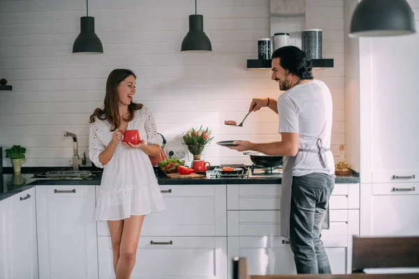 International Women Day Young Couple Morning Kitchen Home Man Cooks — Stock Photo, Image
