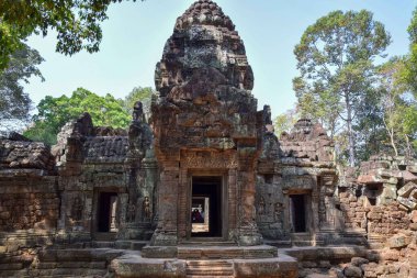 angkor wat ancient temple ruins with tower in front of jungle, cambodia, southeasi asia