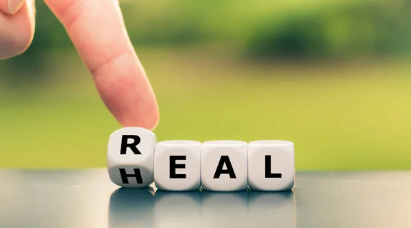 Dice form the expression real heal". — 스톡 사진