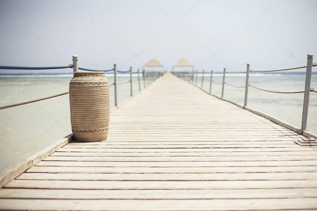 Wooden pontoon stretching into the Red sea