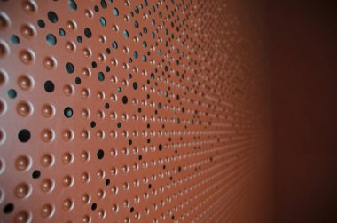 Yuvarlak delik ile Metalik arka plan