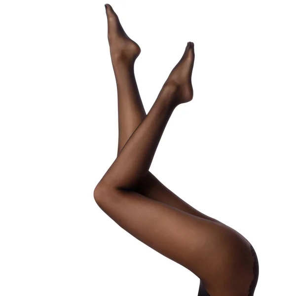 Жіночі ноги в чорних колготках — стокове фото