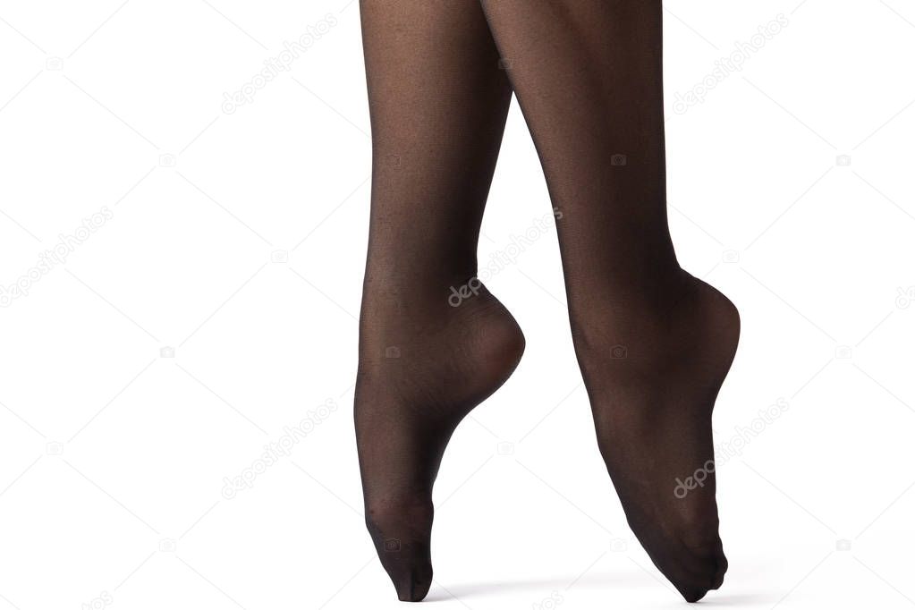 Female legs in black stockings