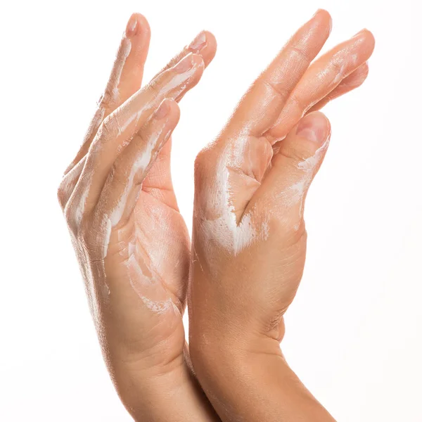Mani femminili e crema idratante — Foto Stock