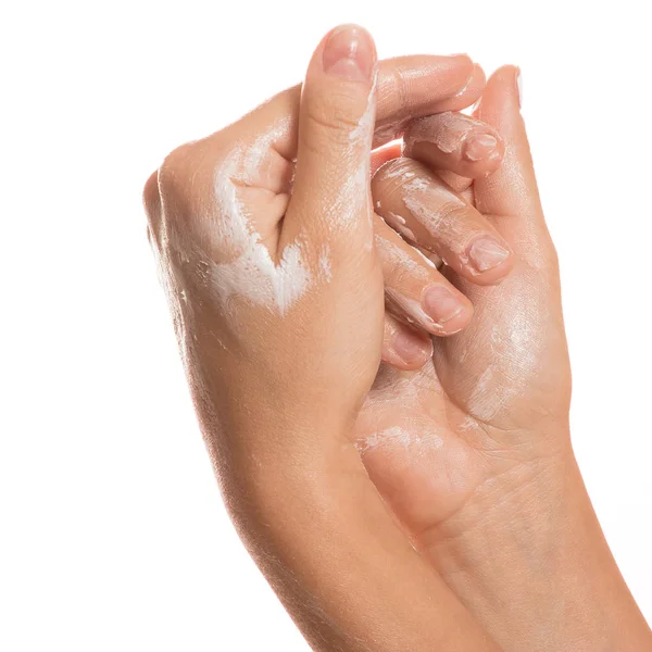 Female hands and moisturizing cream — Stock Photo, Image