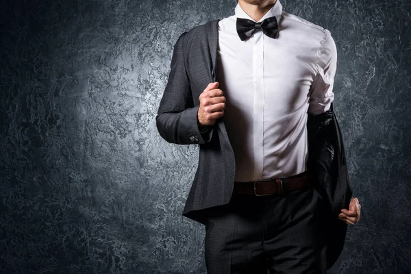 Stylish man in suit with bow tie — Stock Photo, Image