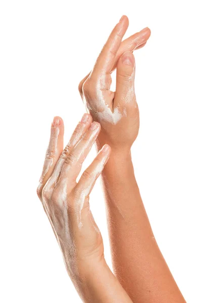 Female hands and moisturizing cream — Stock Photo, Image