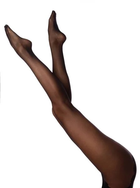 Γυναικεία πόδια στο μαύρο καλσόν — Φωτογραφία Αρχείου