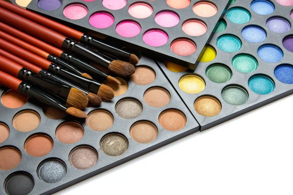 Professional makeup brushes and eyeshadow palette — Stock Photo, Image