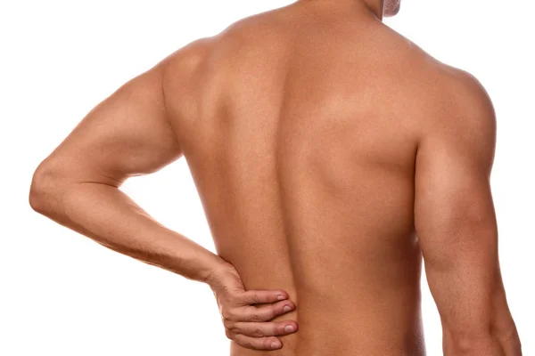 Mann spürt Schmerzen im kleinen Rückenbereich — Stockfoto