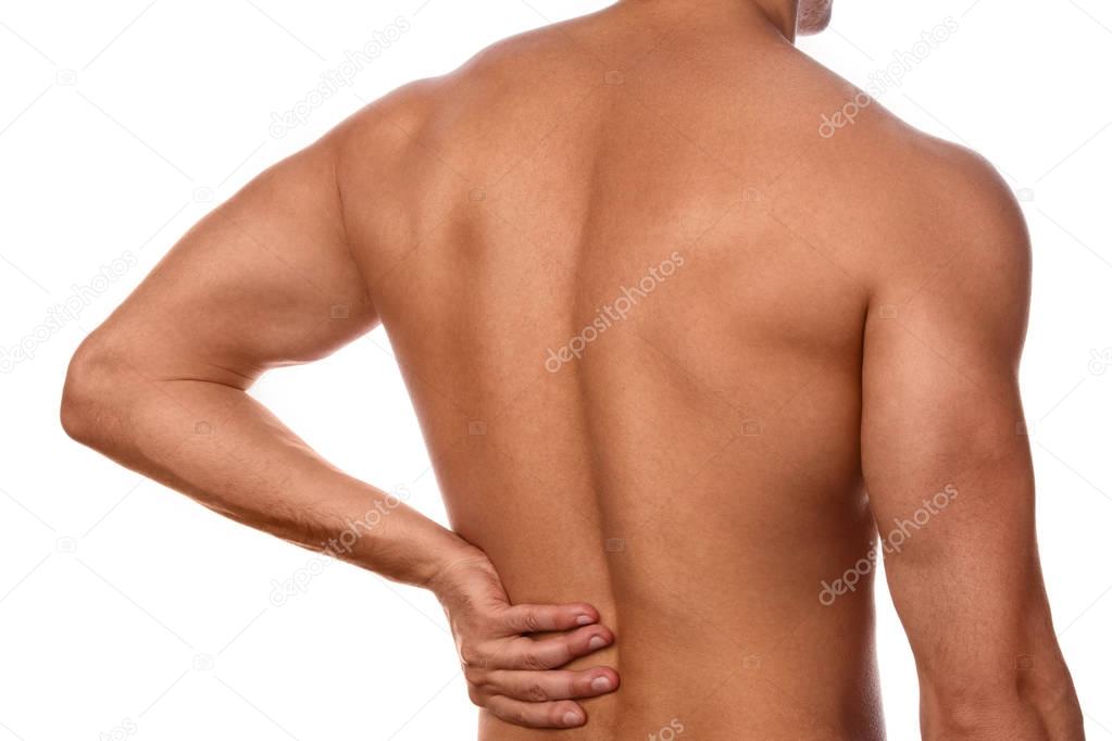 Man feels pain in the small of the back