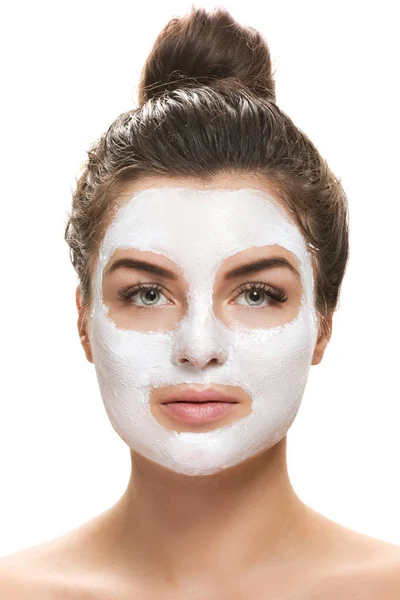 Beautiful woman with facial mask — Stock Photo, Image