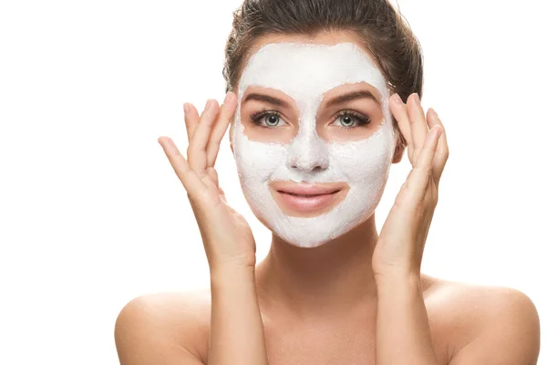 Beautiful woman with facial mask — Stock Photo, Image