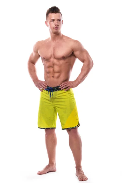 Junges Fitness-Model in grünen Shorts — Stockfoto