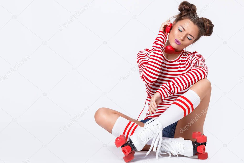 Beautiful woman in the roller-skates 