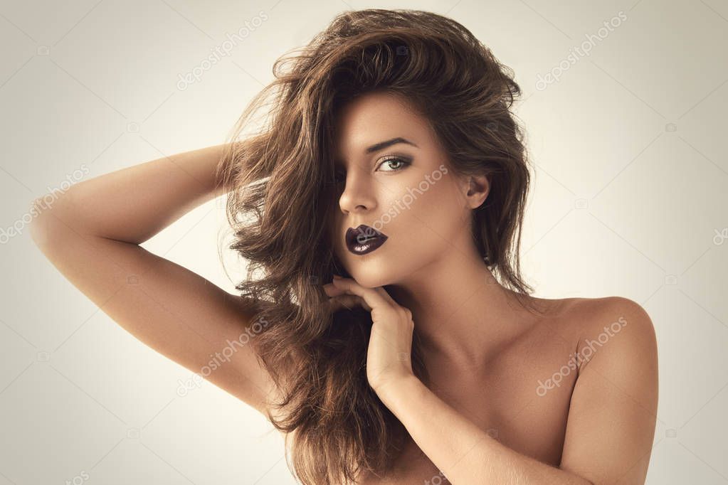 Beautiful woman with dark lipstick 