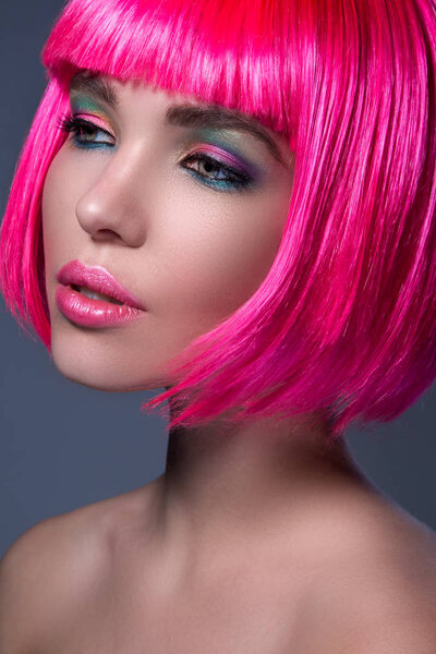 young woman with pink hair