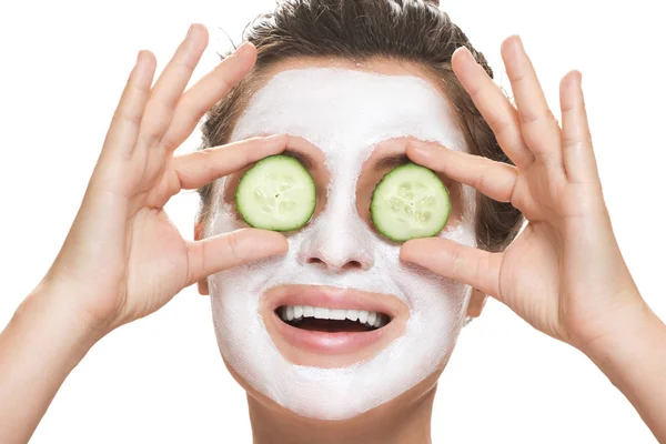 Woman with facial mask — Stock Photo, Image