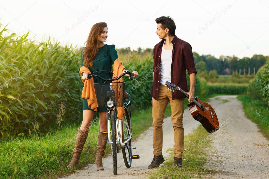 Young couple walking on road