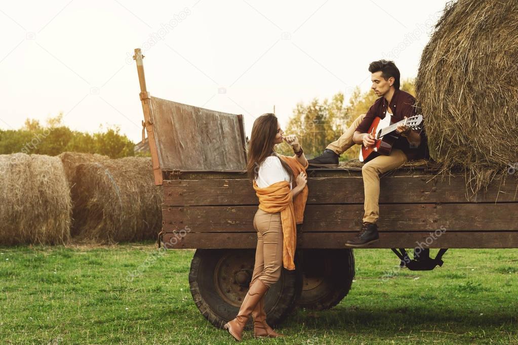 Young lovely couple at village