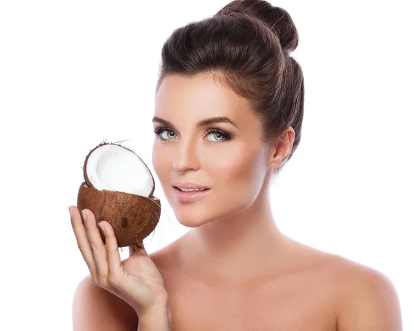 Beautiful young woman with coconut — Stock Photo, Image