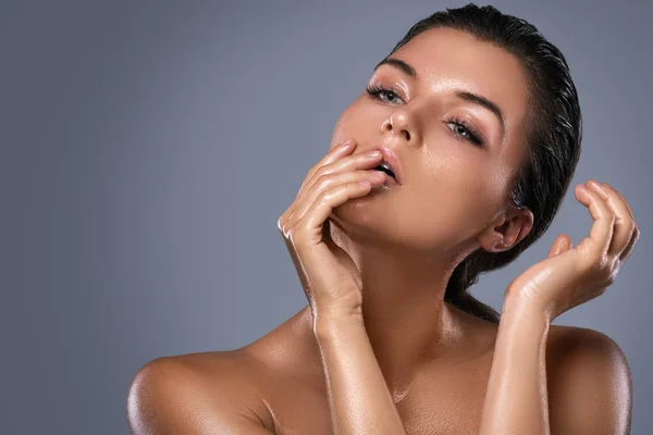 Young woman with oiled skin — Stock Photo, Image