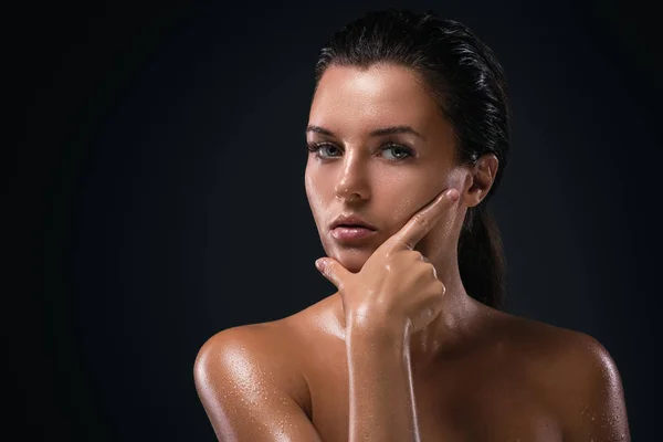 Young woman with oiled skin — Stock Photo, Image