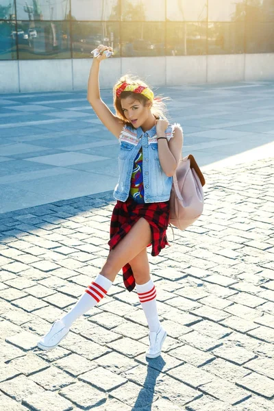 Stylish teenage girl with backpack — Stock Photo, Image