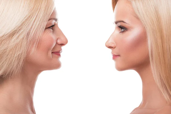 Beautiful mature mother and daughter — Stock Photo, Image