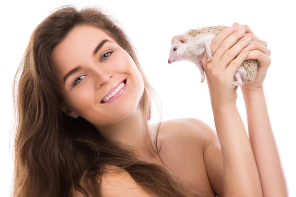 Happy woman and cute little hedgehog — Stock Photo, Image