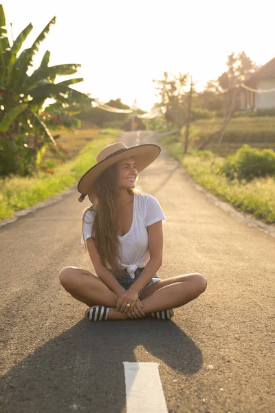Young Happy Woman Sitting Middle Asphalt Road — Stock Photo, Image