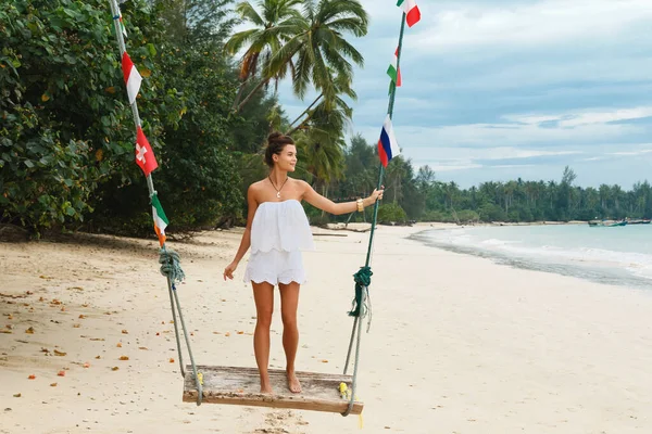 Young Beautiful Woman Wearing White Jumpsuit Swings Beach — Stock Photo, Image