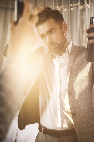 Young Handsome Bearded Man Using Hairspray — Stock Photo, Image