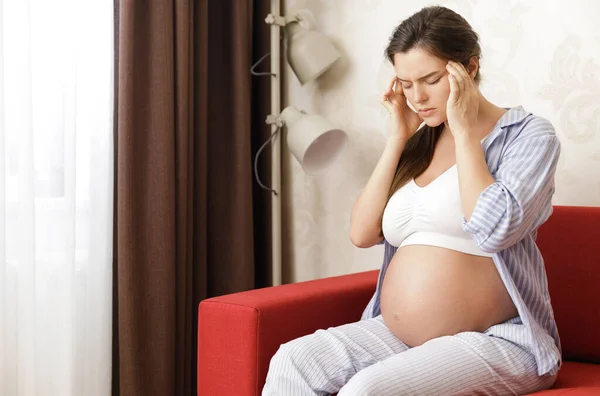 Young Pregnant Woman Sitting Sofa Home Painful Headache — Stock Photo, Image
