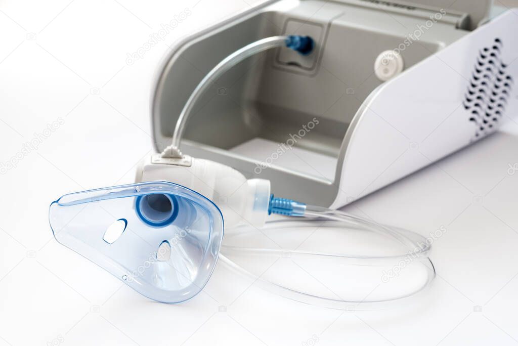 apparatus for artificial ventilation of the lungs. nebulizer closeup on a white background. treatment of diseases of the lungs and respiratory system