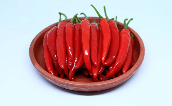 Chili Peppers Pottery Plate White Background — Stock Photo, Image